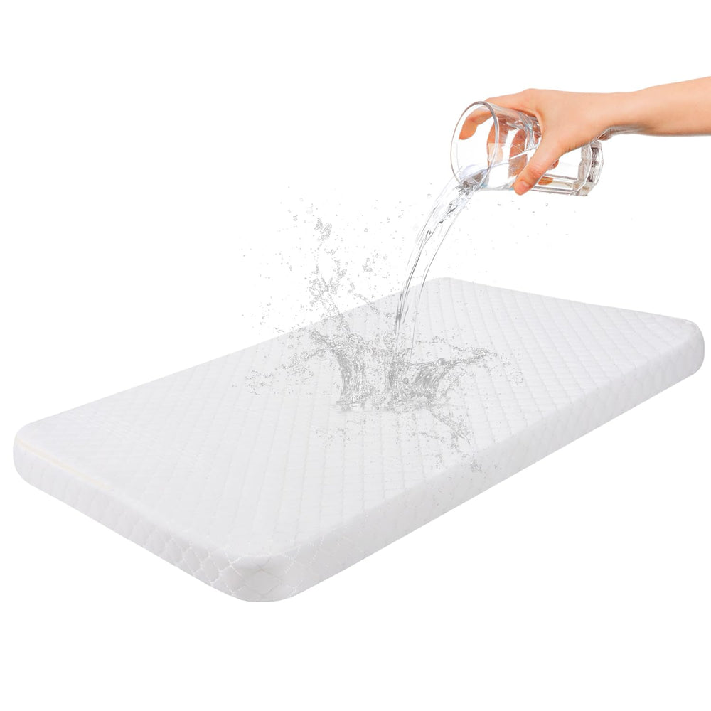 Wonder Living bassinet topper waterproof exterior keeps baby dry during spills.