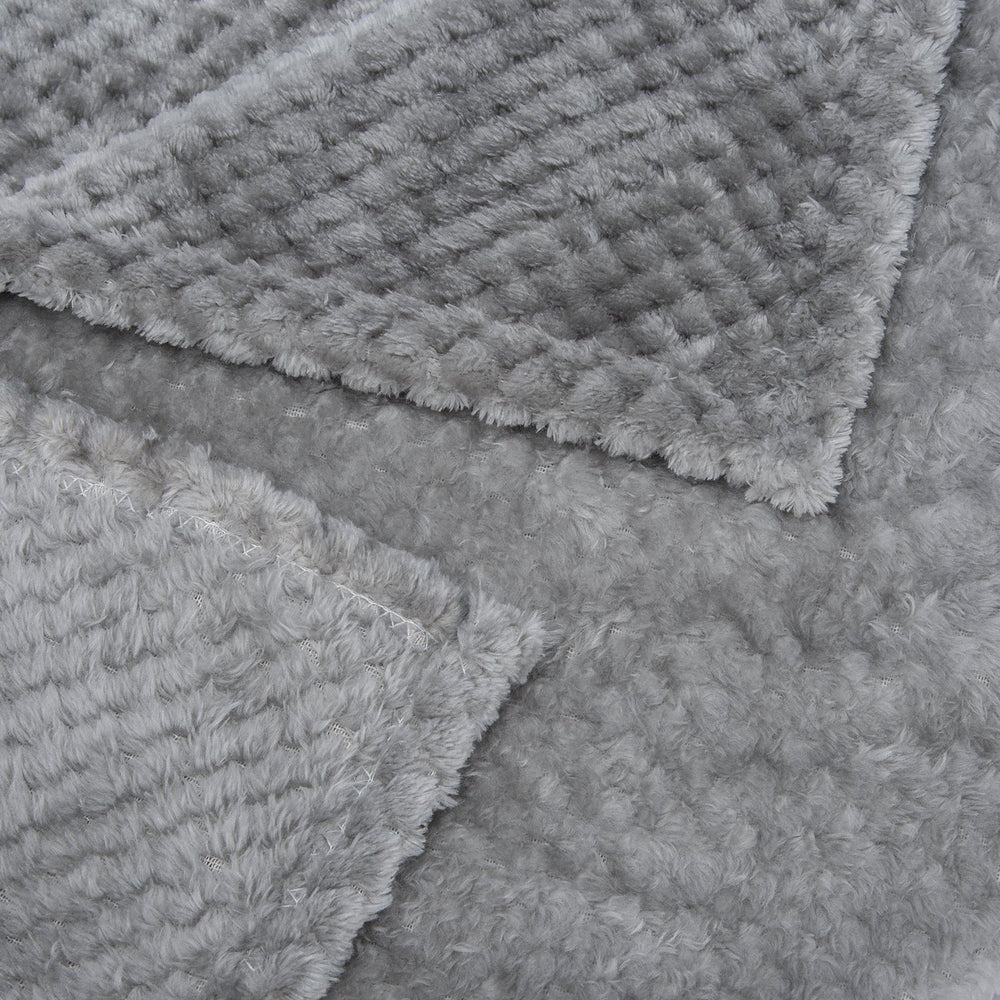 Wonder Miracle blanket rolled for travel highlights portability