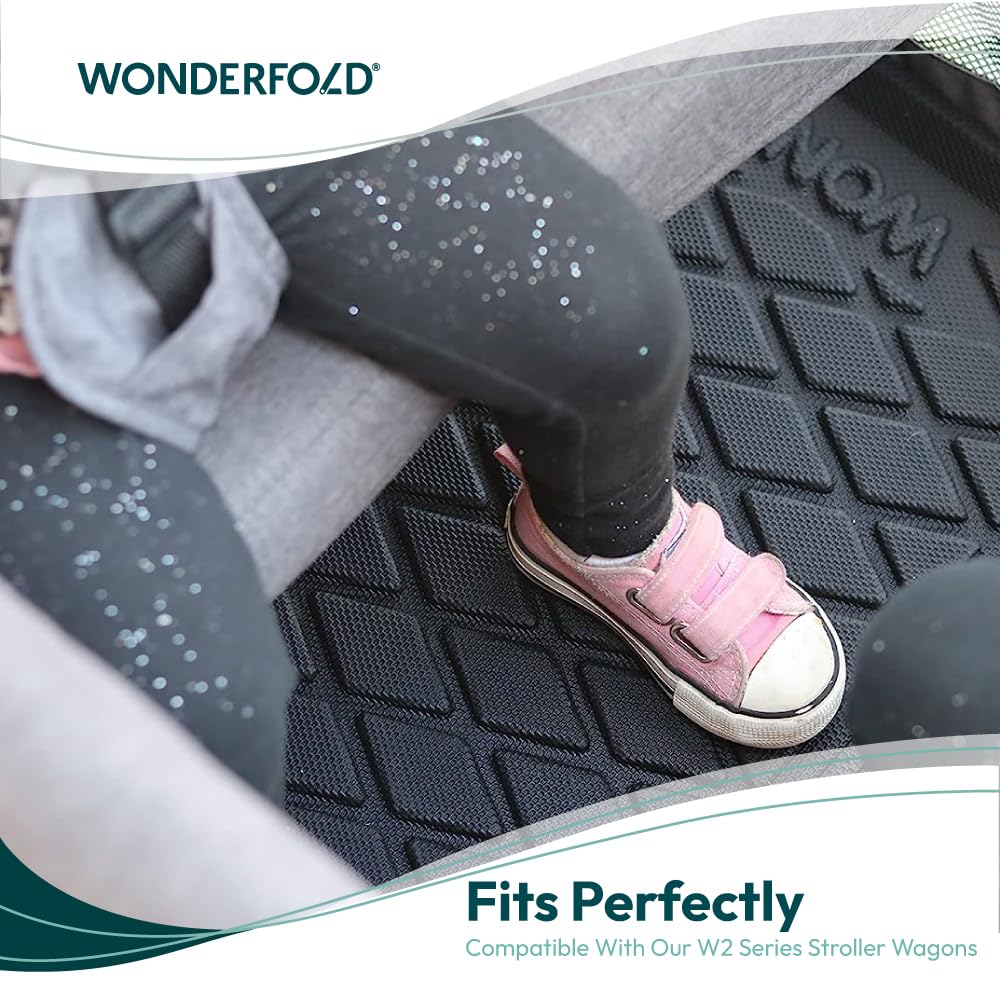 WonderFold All Weather Mat W2 showing waterproof dirt protection on rough terrain.