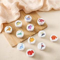 Wooden Teether dinosaur knob closeup highlighting natural wood texture for charming nursery decor