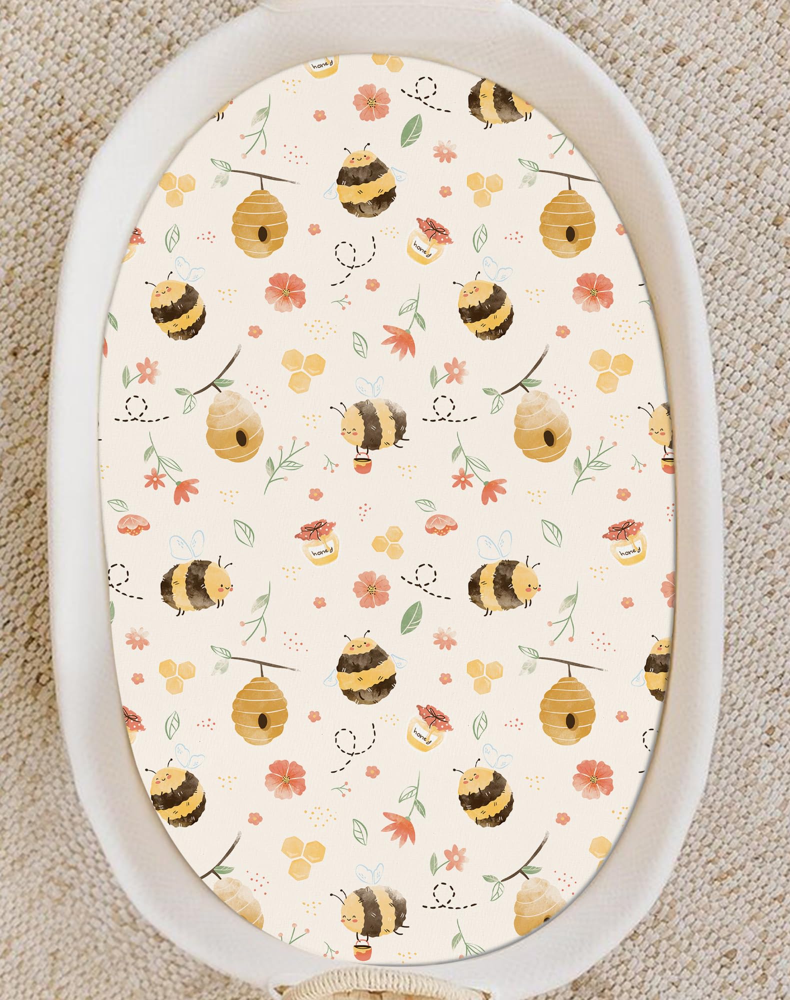 Woodiville bassinet-sheet-stain-friendly-pattern hides stains for tidy sleep spaces