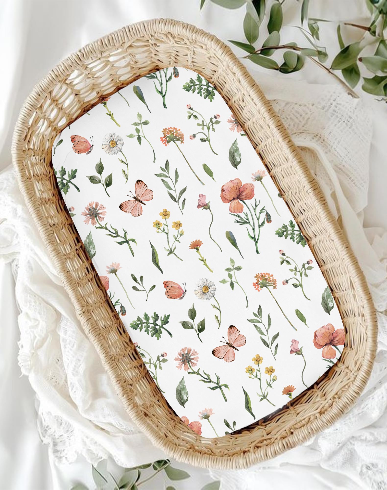 Woodiville bassinet sheets care-chart demonstrates machine-washable, quick-dry convenience.