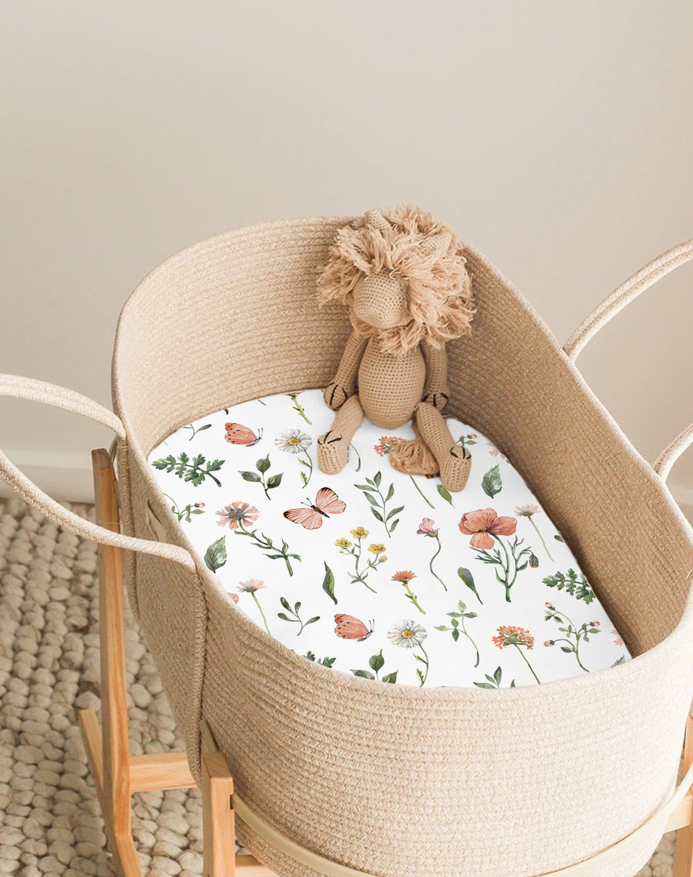 Woodiville bassinet sheets elastic-edge closeup showcases secure snug fit during naps.