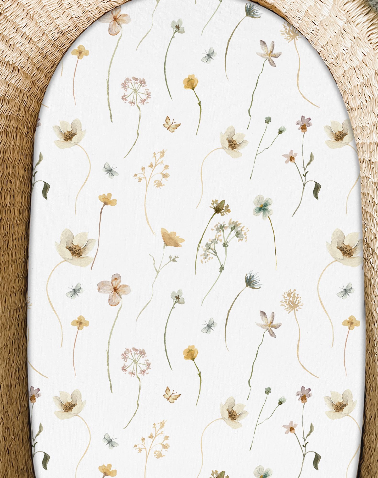 Woodiville bassinet sheets in a nursery setting illustrate a serene sleep space for baby.