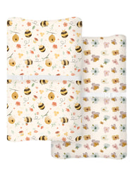 Woodiville Bee Happy pattern on pad shows snug fit for quick diaper changes.