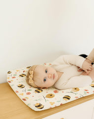 Woodiville changing pad cover machine washable for quick cleanup after messes.