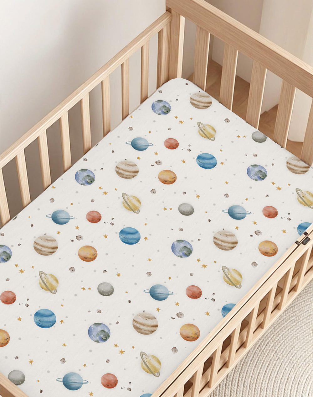 Woodiville Stellar Adventure two-pack of crib sheets provides ready backups.