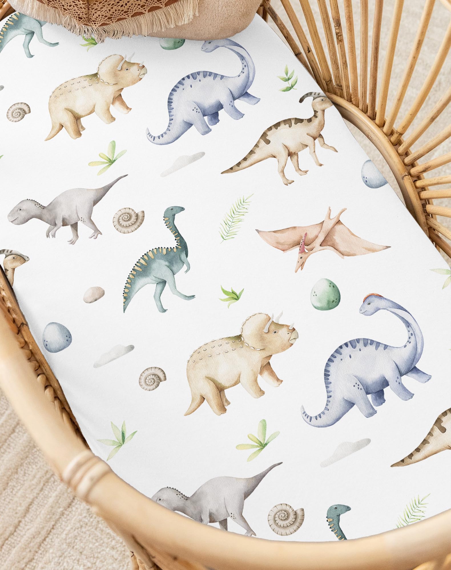Woodiville Dino Pals pattern helps hide stains in nursery