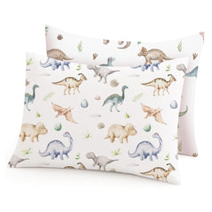 Woodiville Dino Pals pillowcase close-up shows silky fabric for gentle toddler skin during sleep.
