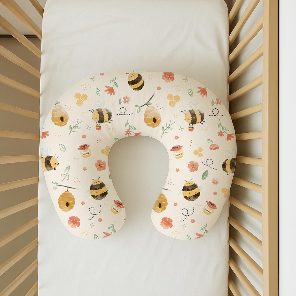 Woodiville Honeybee Dreams nursing pillow cover with stretchy fit for stable feeding.