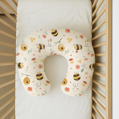 Woodiville Honeybee Dreams nursing pillow cover with stretchy fit for stable feeding.