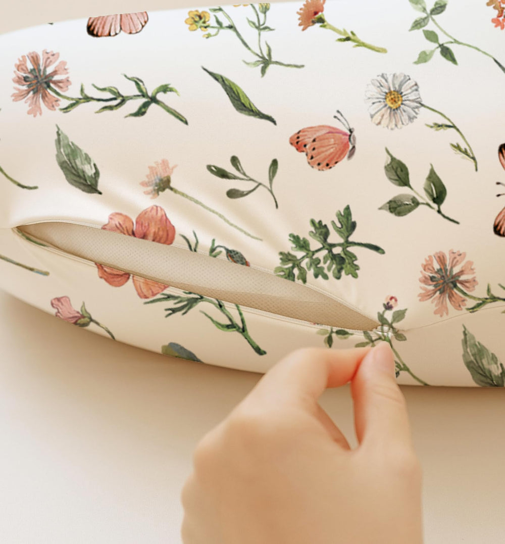 Woodiville elastic-edged pillow cover provides secure grip during nursing sessions.