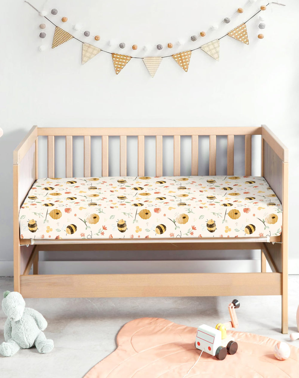 Woodiville Pack N Play Sheets Rusty Garden fit on mattress demonstrates secure, flat surface.