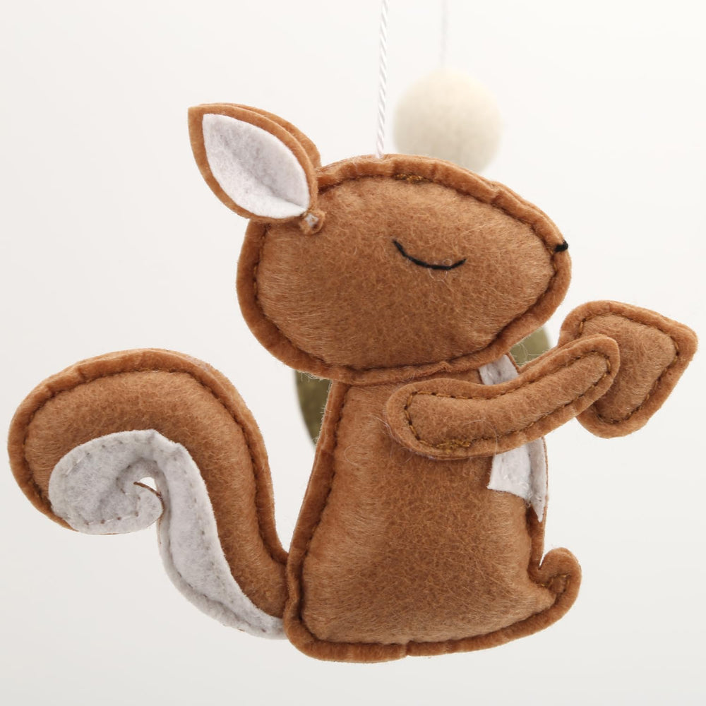 Woodland Animals Baby Mobile deer-figurines add natural woodland charm.