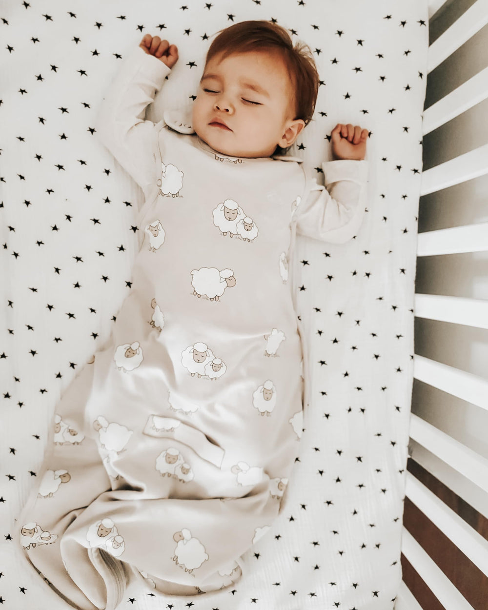 Woolino seatbelt slots support safe stroller-to-crib transfers