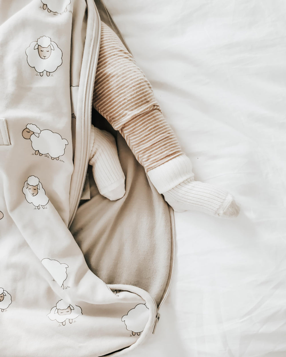Woolino under-arm snaps let the blanket grow with your child