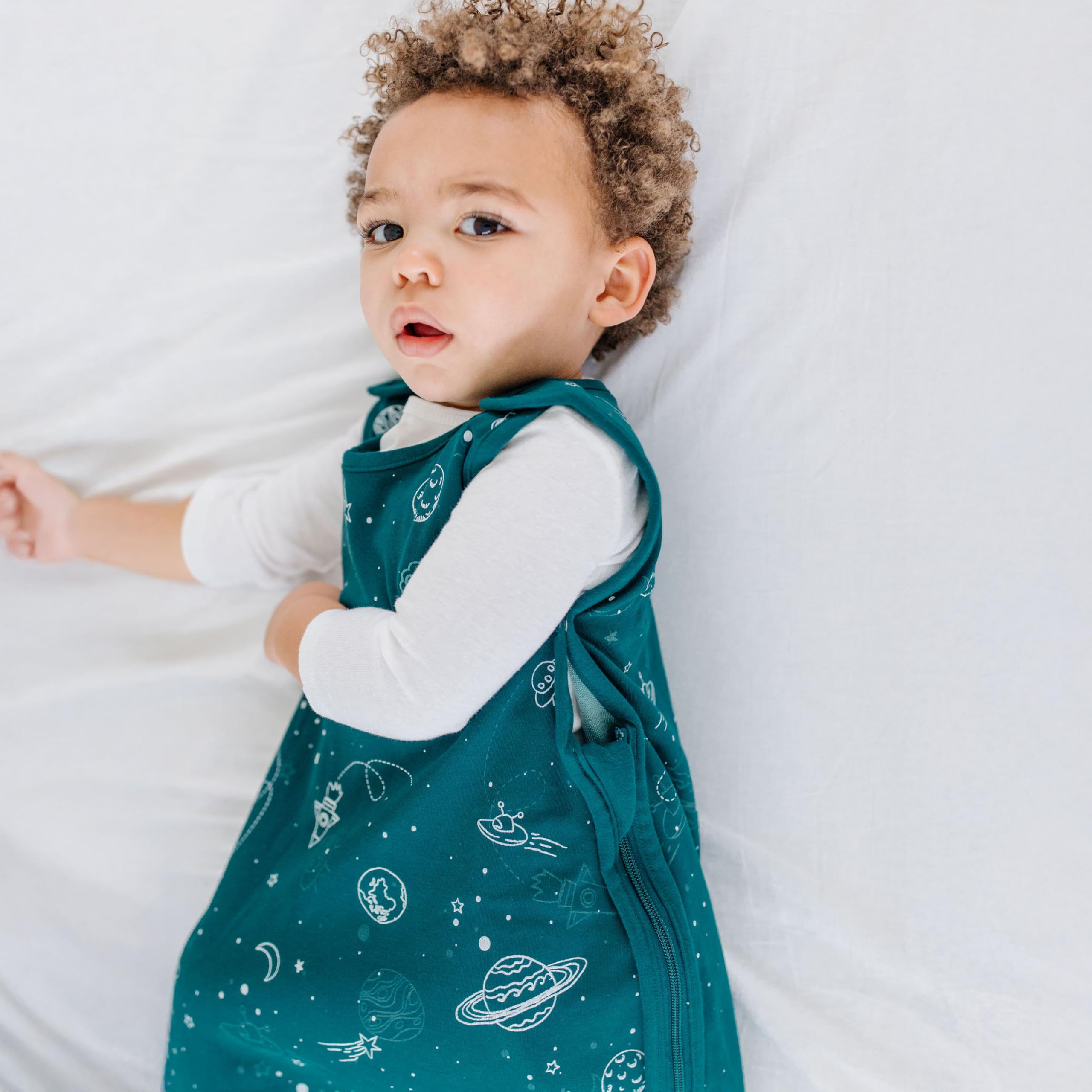 Woolino Big Kid Sleeping Bag glow-in-the-dark Space color bedtime aid.