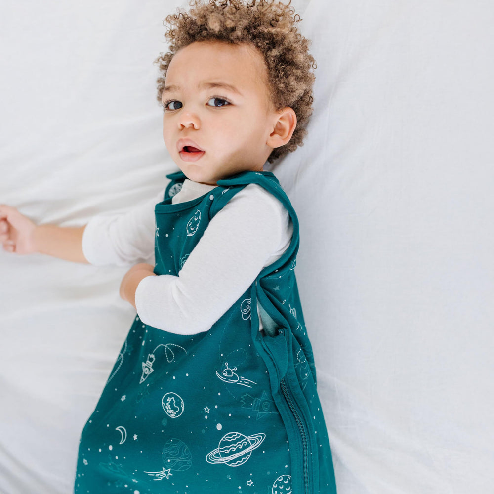 Woolino Big Kid Sleeping Bag glow-in-the-dark Space color bedtime aid.