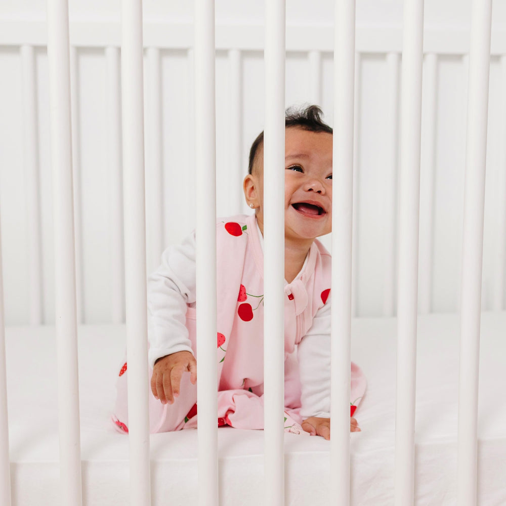 Woolino Ecolino cherry detail conveys stylish, toddler-appropriate sleepwear with comfort.