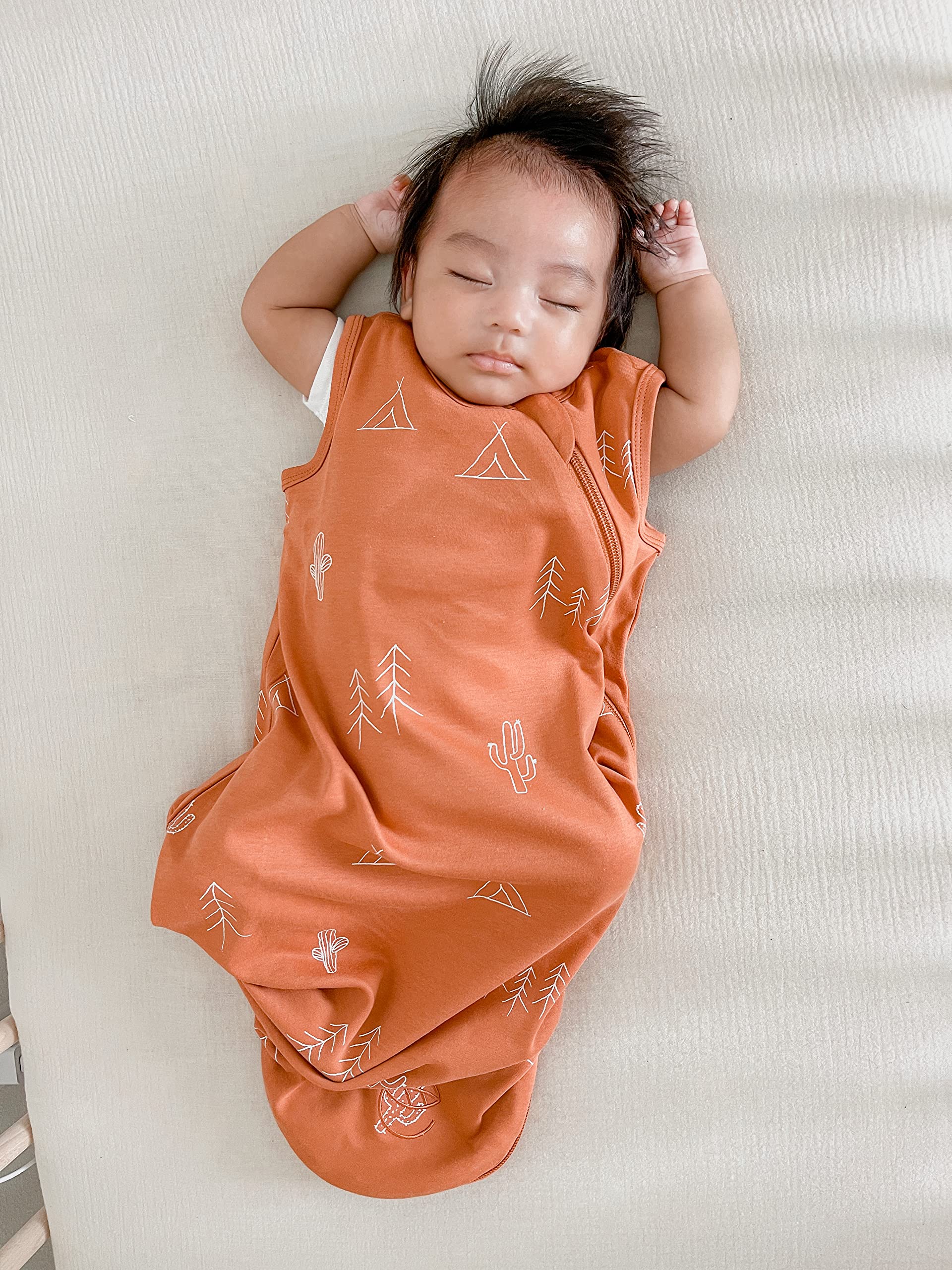 Woolino Ecolino baby wearing desert sleep sack demonstrates comfortable fit and cozy night.
