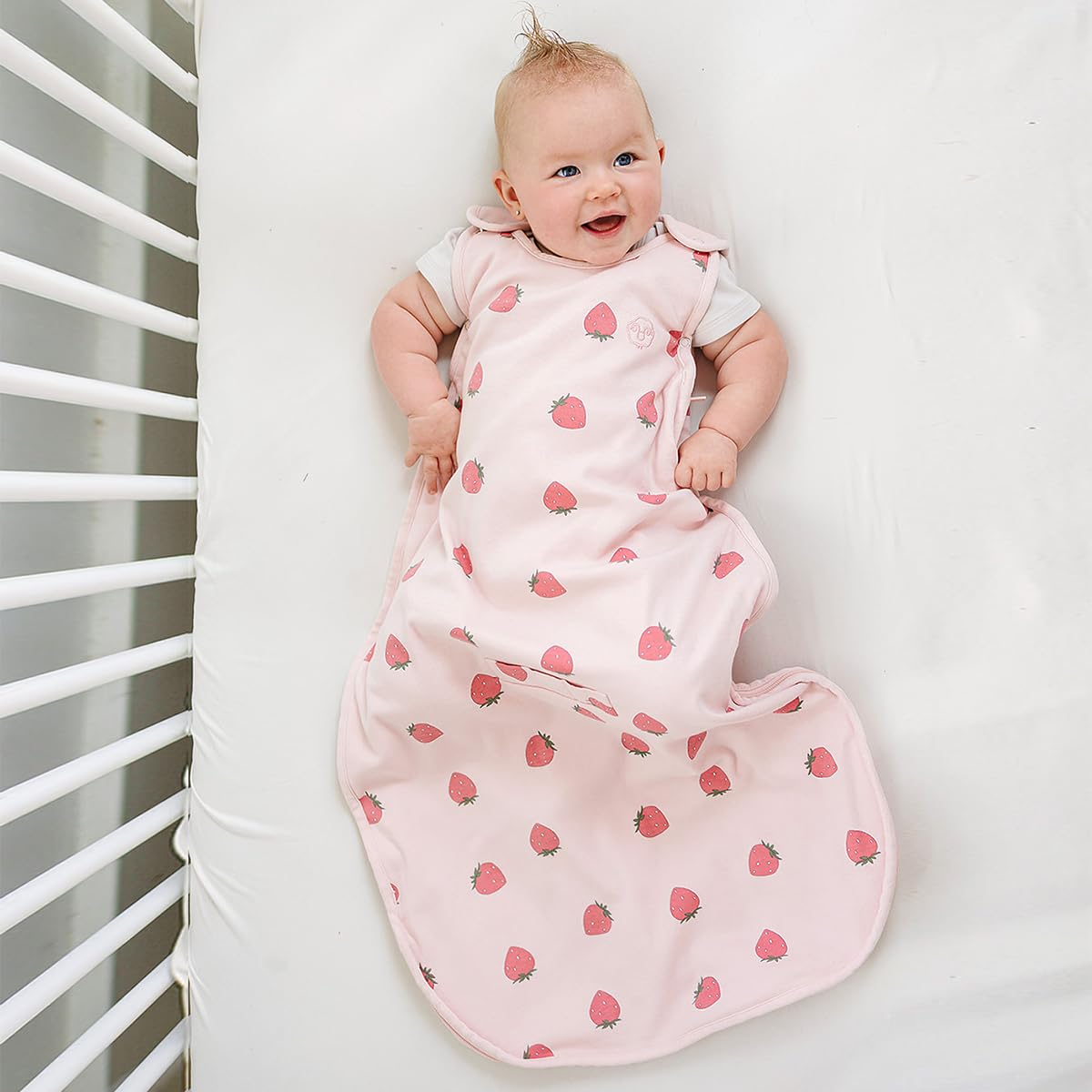 Woolino Merino Sleep Sack strawberry side view showing universal size fit.