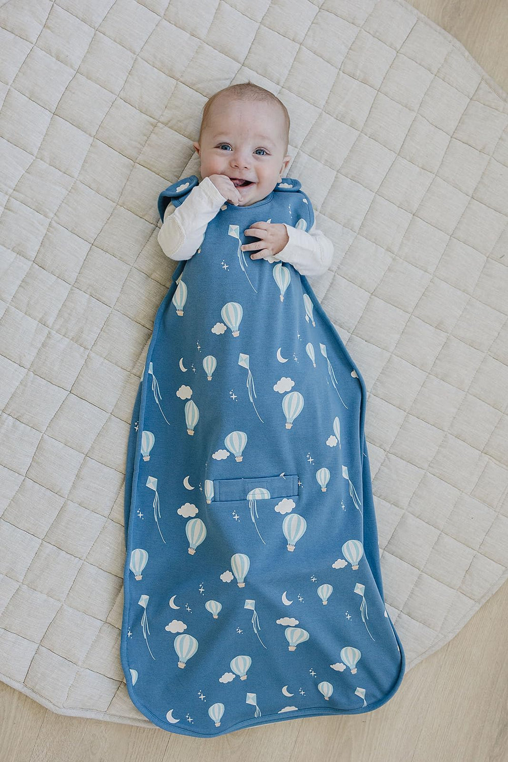 Woolino Merino Sleep Sack seat-belt slot supports safe transfers.