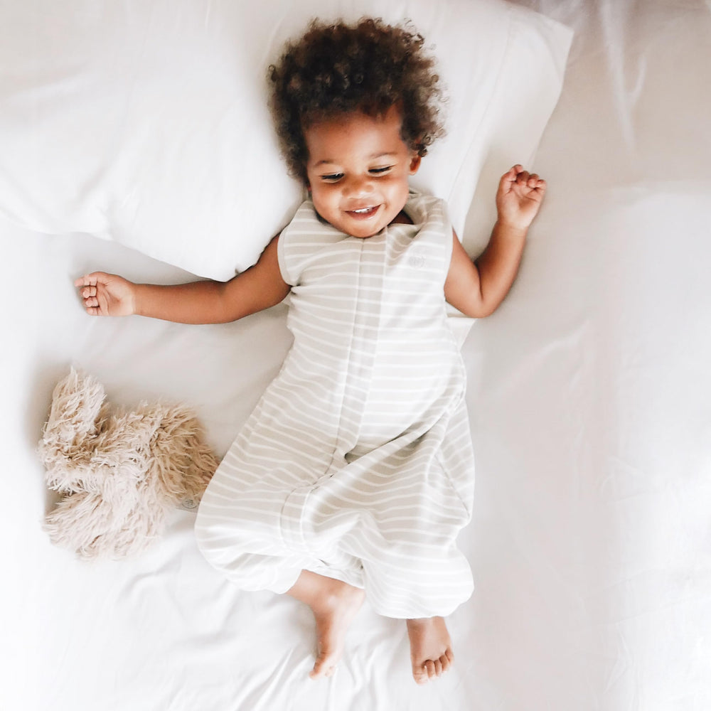 Woolino bottom-zip design aids quick diaper changes while baby rests.