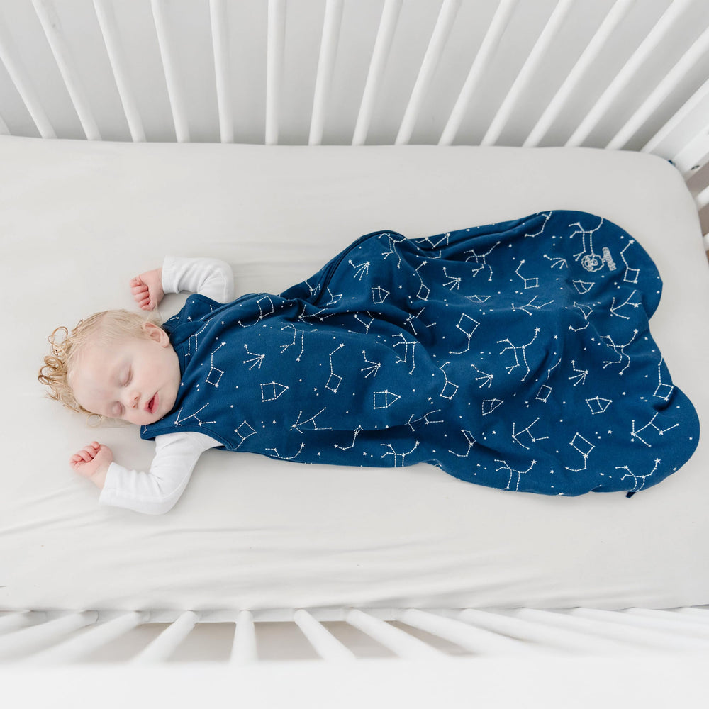 Woolino Night Sky two-way zipper image highlights easy dressing and diaper changes