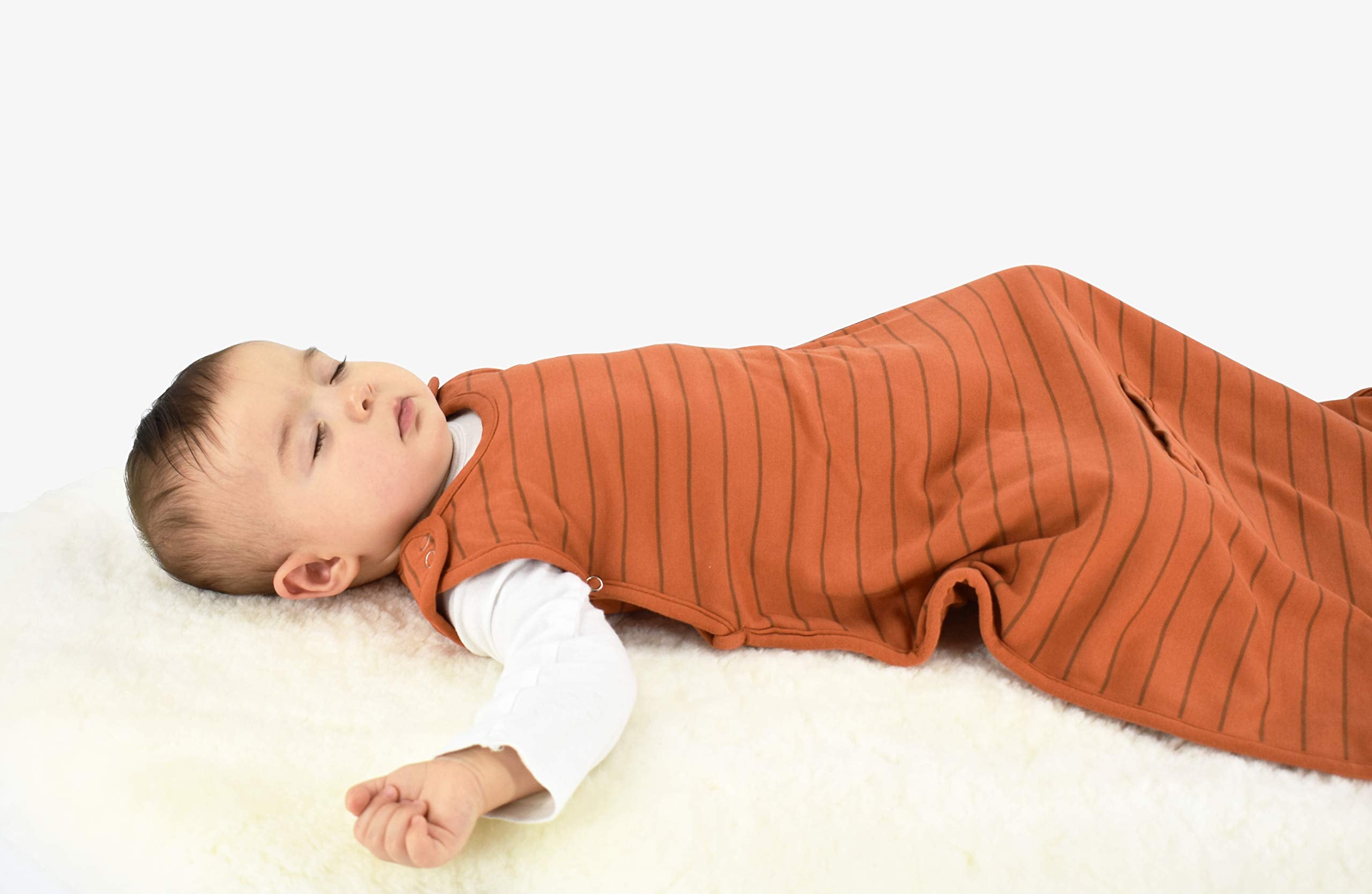 Woolino sleep sack with closable seat belt slots for transfers.