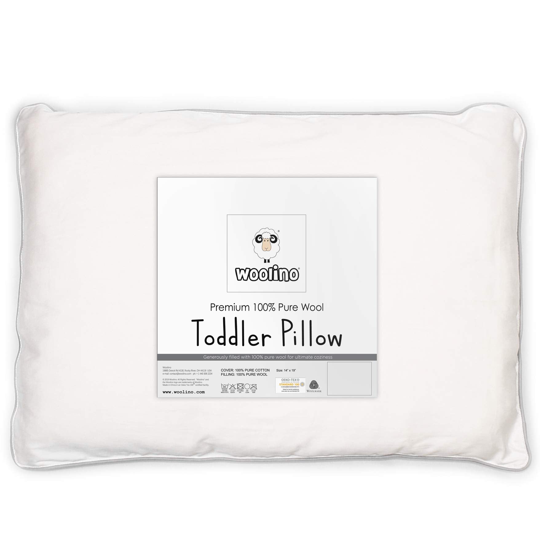 Woolino toddler pillow wool-fill closeup highlights breathable, safe sleep surface.