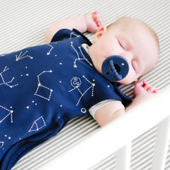 Woolino Toddler Sleeping Bag night sky zipper demonstrates easy dressing and quick transitions.