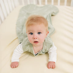 Woolino two-way zipper detail enables easy dressing and diaper changes.