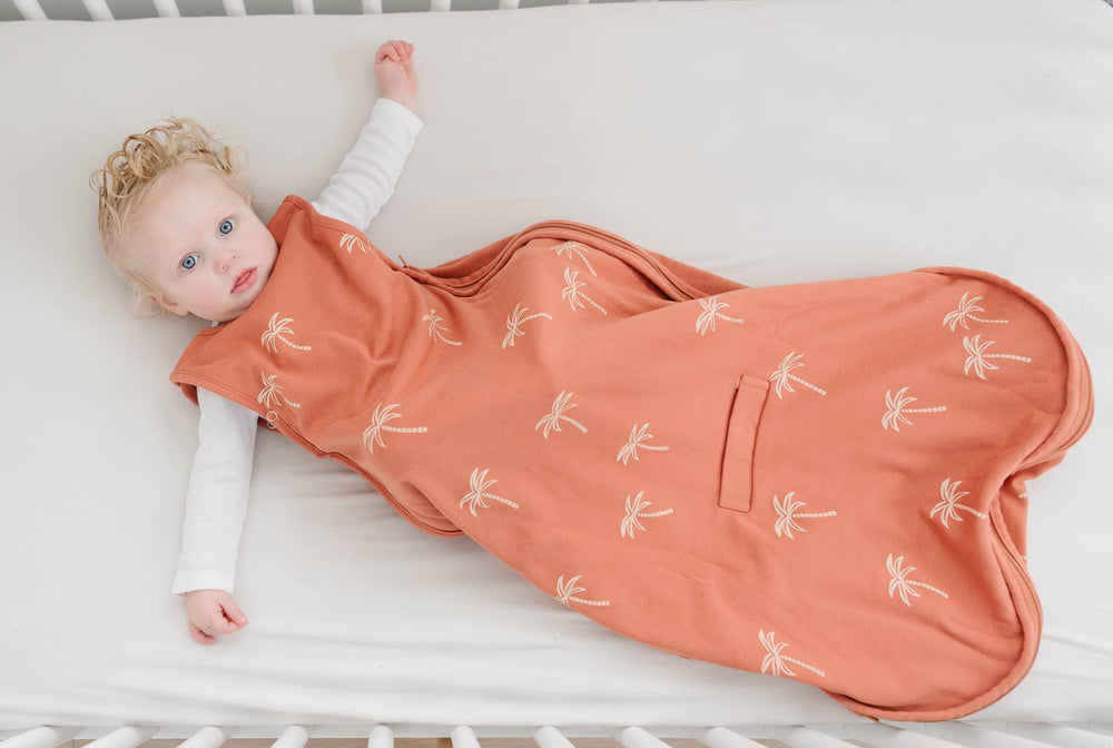 Woolino under-arm snaps show growth with baby during use.