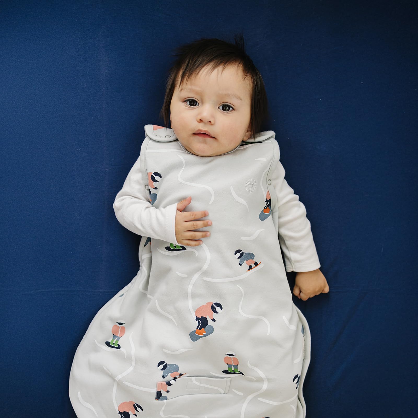 Woolino universal size 2m-2y worn to showcase growth-friendly design.