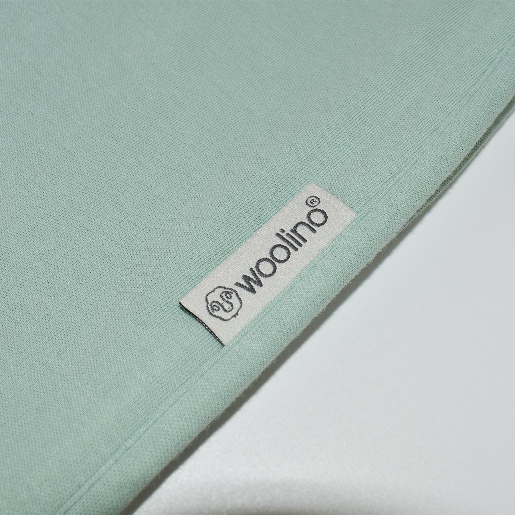 Woolino year-round warmth for sleeping comfort in Aloe color.