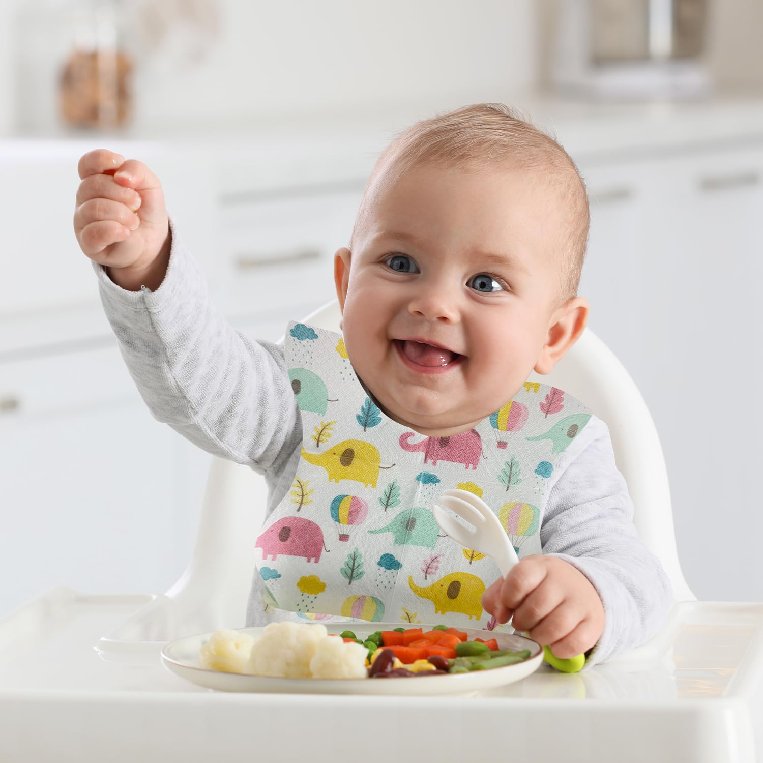WOOWME dinosaur design bib encourages meals with a playful touch.