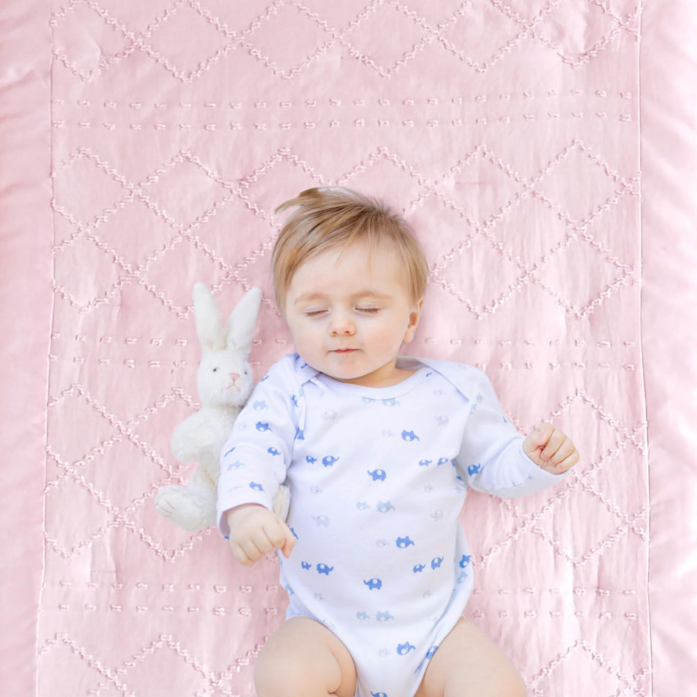 Wowelife mini crib bedding fits a 24x38 mini crib snugly