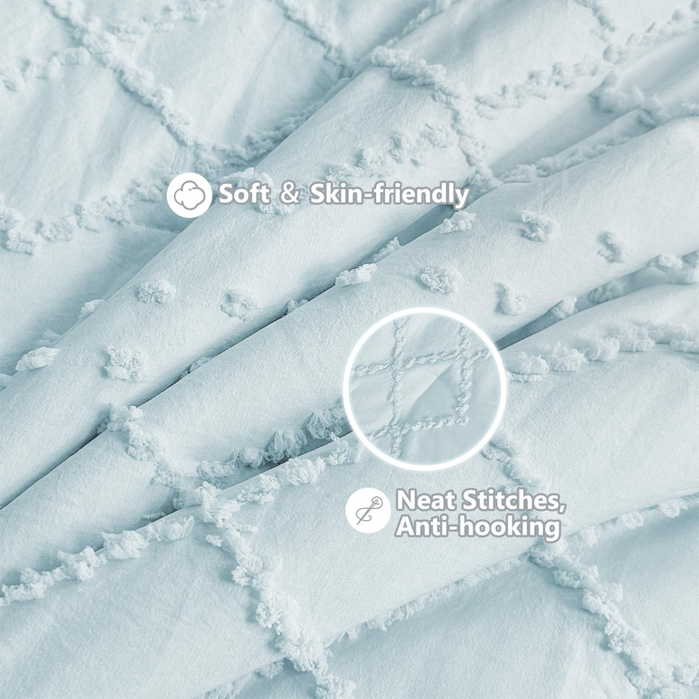 Wowelife crib bedding elastic-sheet close-up demonstrating secure fit on mini crib