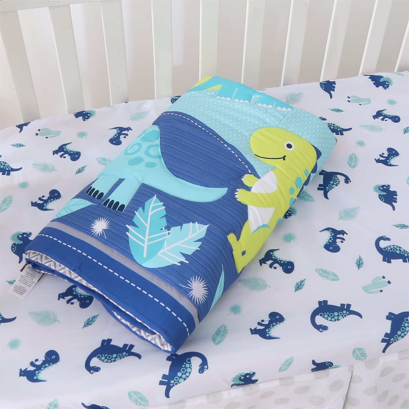 Wowelife dinosaur crib bedding care label highlights easy-care washing.