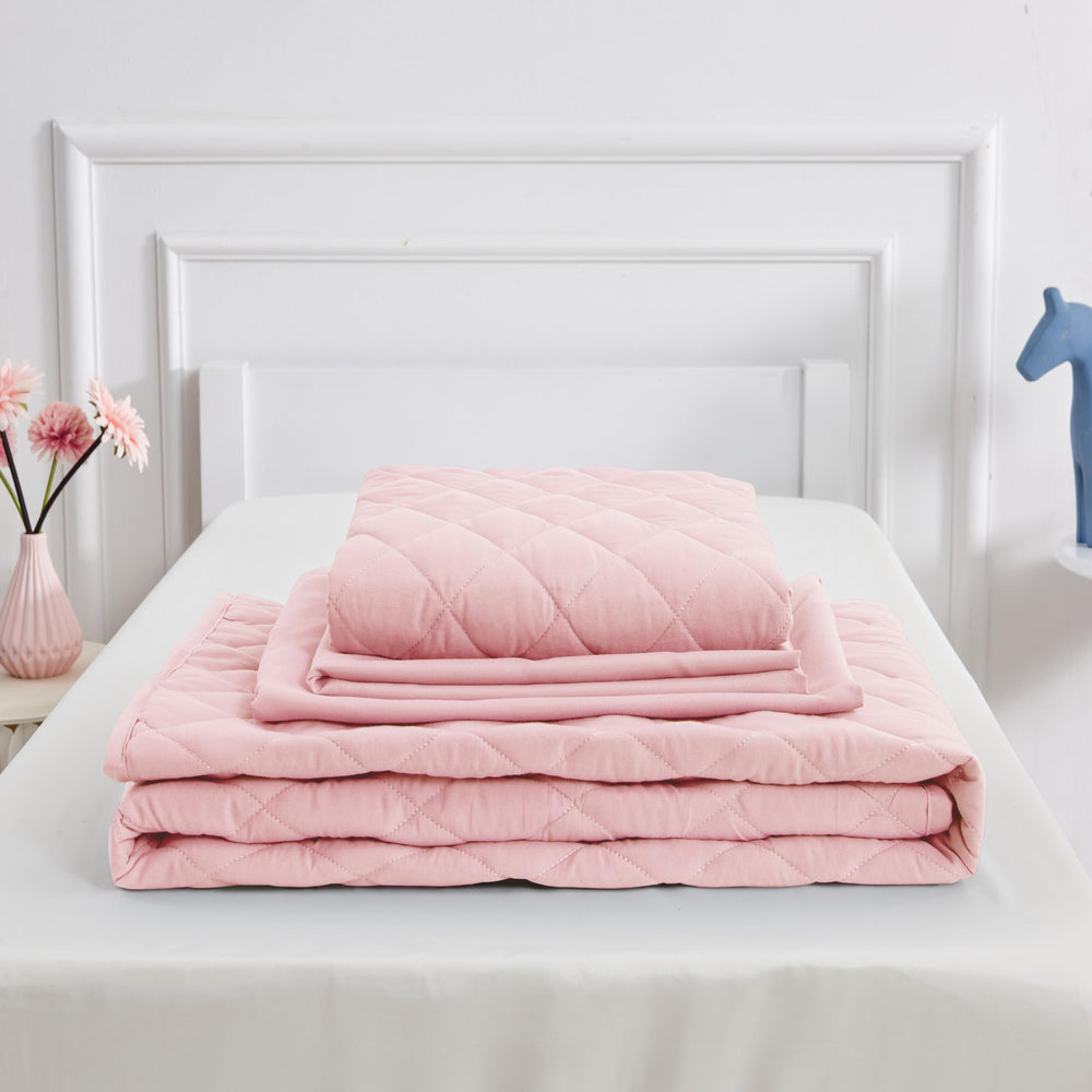 Wowelife pink bed scene highlights easy care and machine-washable fabric.