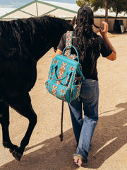 Wrangler Aztec Backpack side straps with stroller attachment for hands-free outings