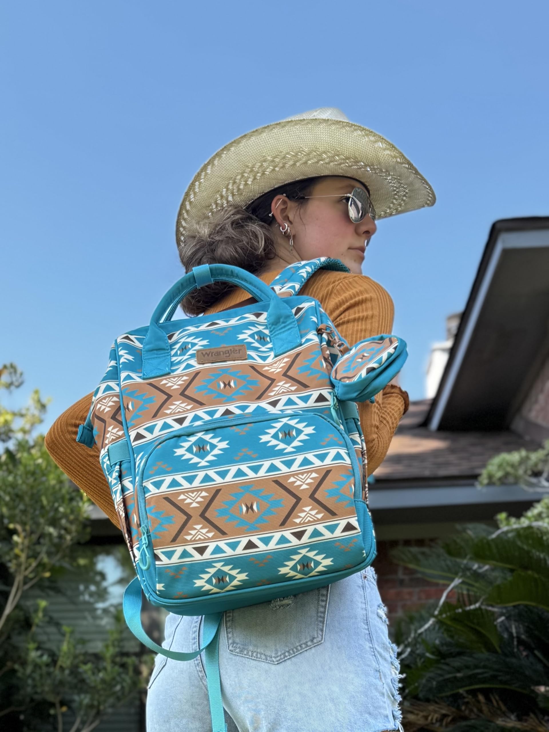Wrangler Aztec Backpack side view with stroller straps for hands-free mobility.