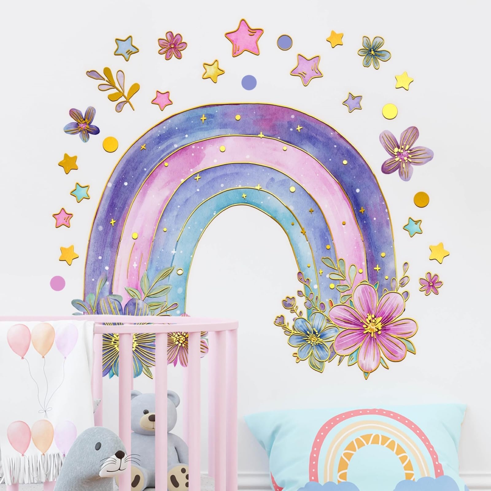 Wrdpyrmnis watercolor rainbow decal adds whimsy to nursery walls for a cozy space.