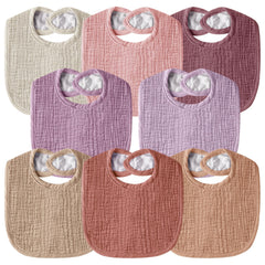 Wrrernsin muslin bib shows absorbent front for drool during teething