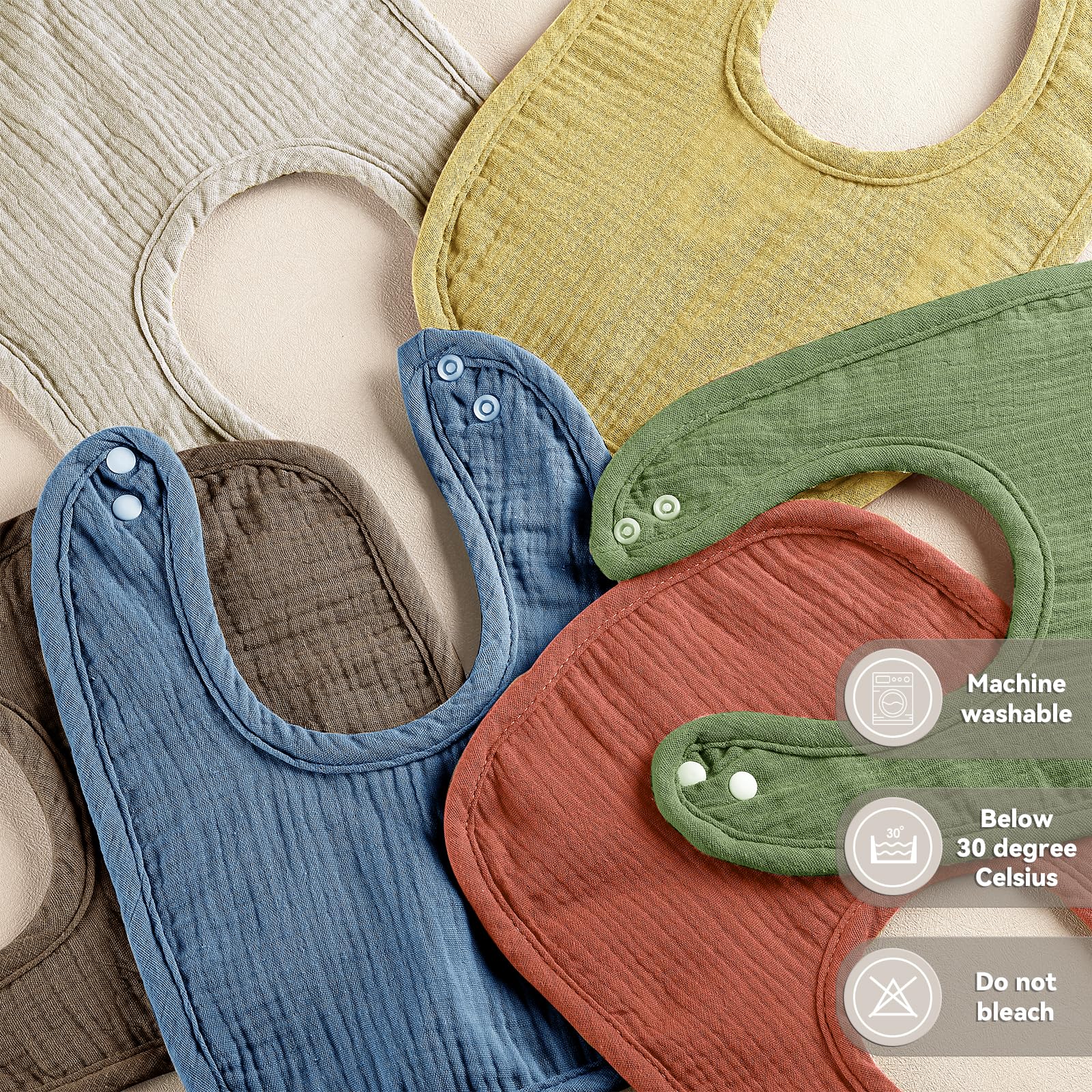Wrrernsin Muslin Baby Bibs with adjustable snaps for a comfy, growing baby.
