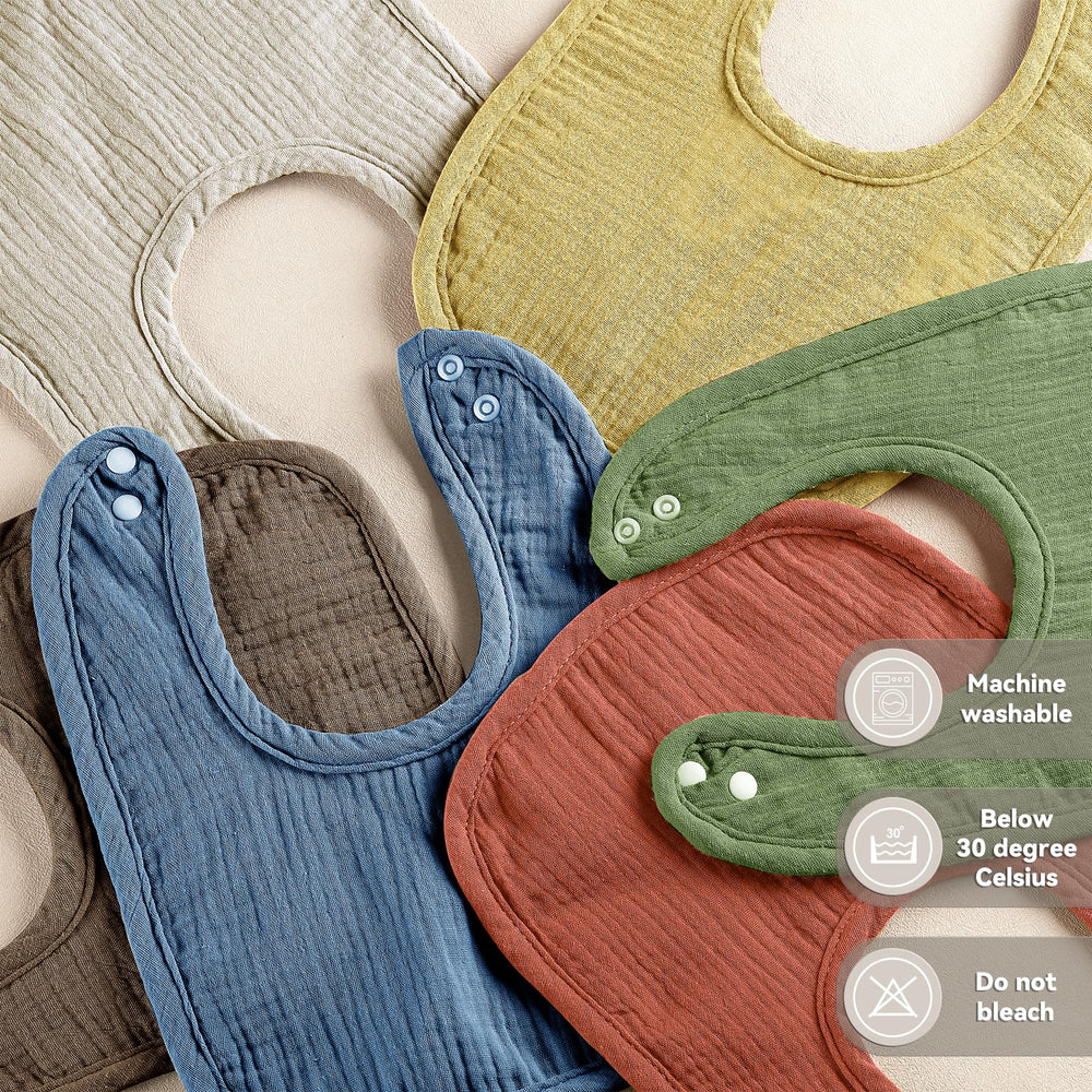 Wrrernsin Muslin Baby Bibs with adjustable snaps for a comfy, growing baby.