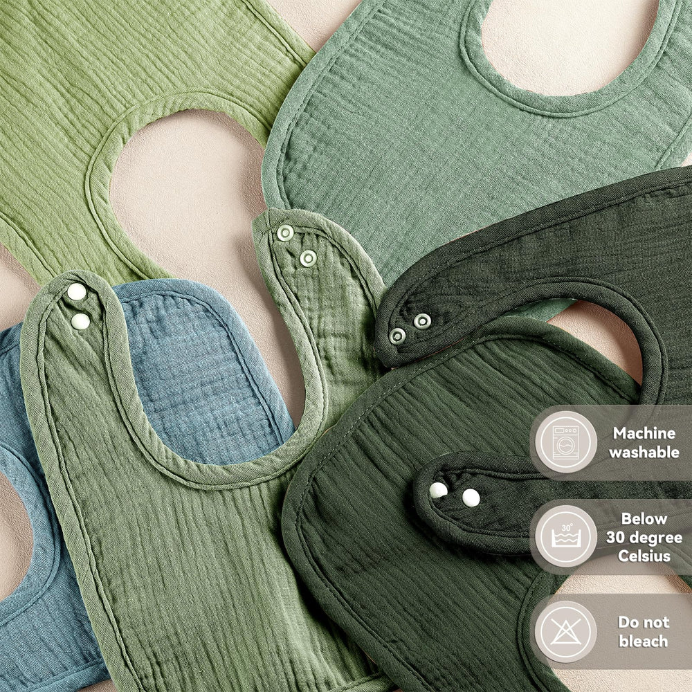 Wrrernsin Muslin Baby Bib wearing on baby illustrates everyday comfort.