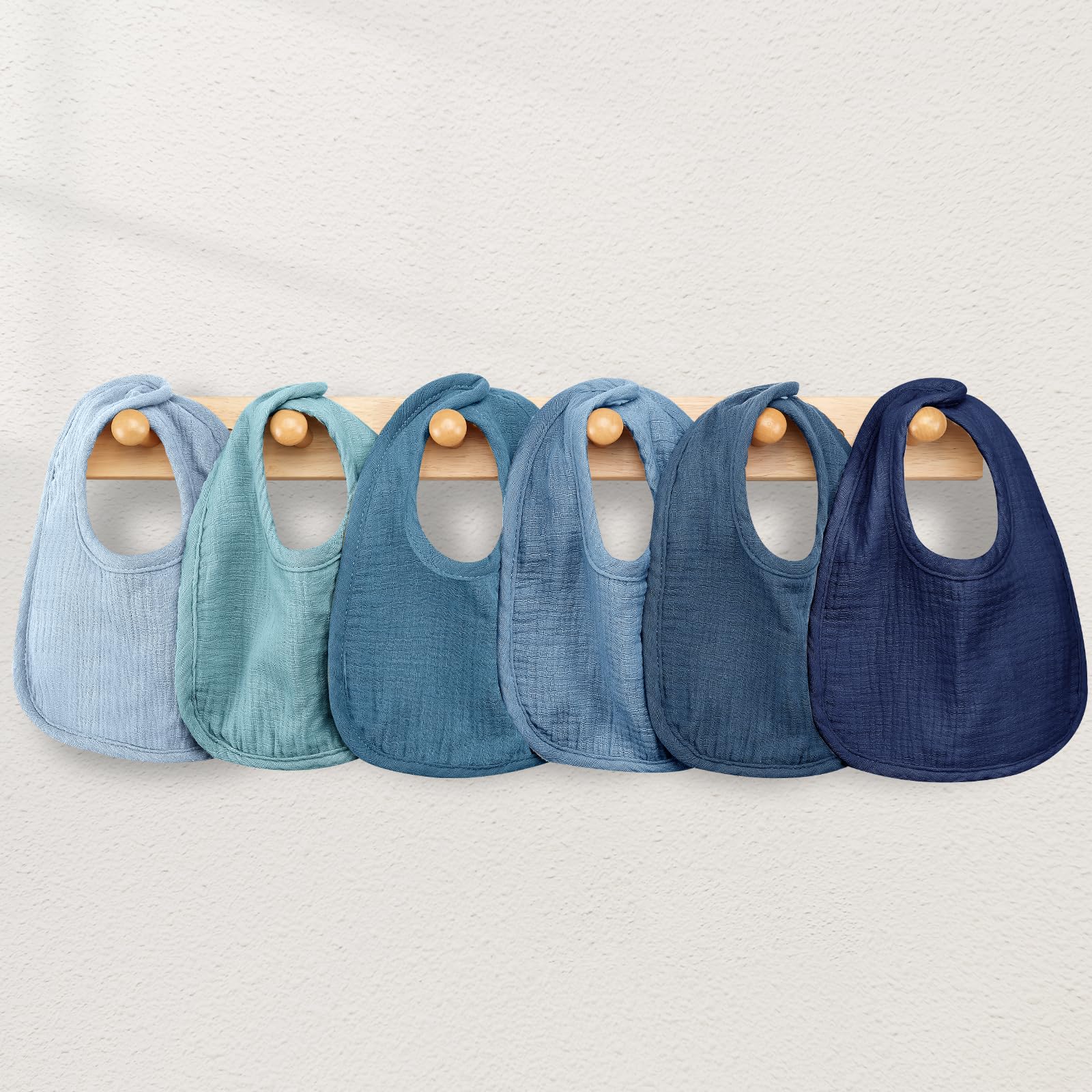 Wrrernsin Muslin Baby Bibs back texture with waterproof satin-like finish.