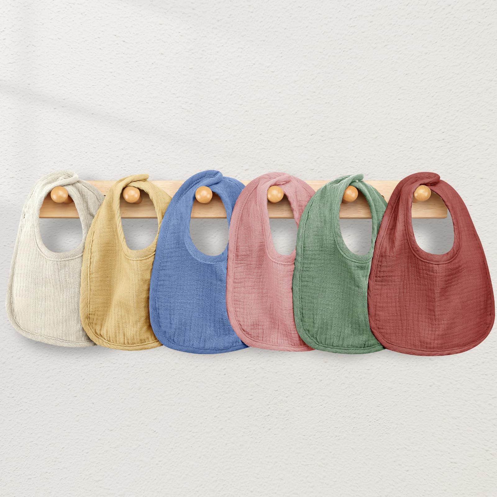 Wrrernsin bibs being washed or packed, highlighting machine-washable convenience