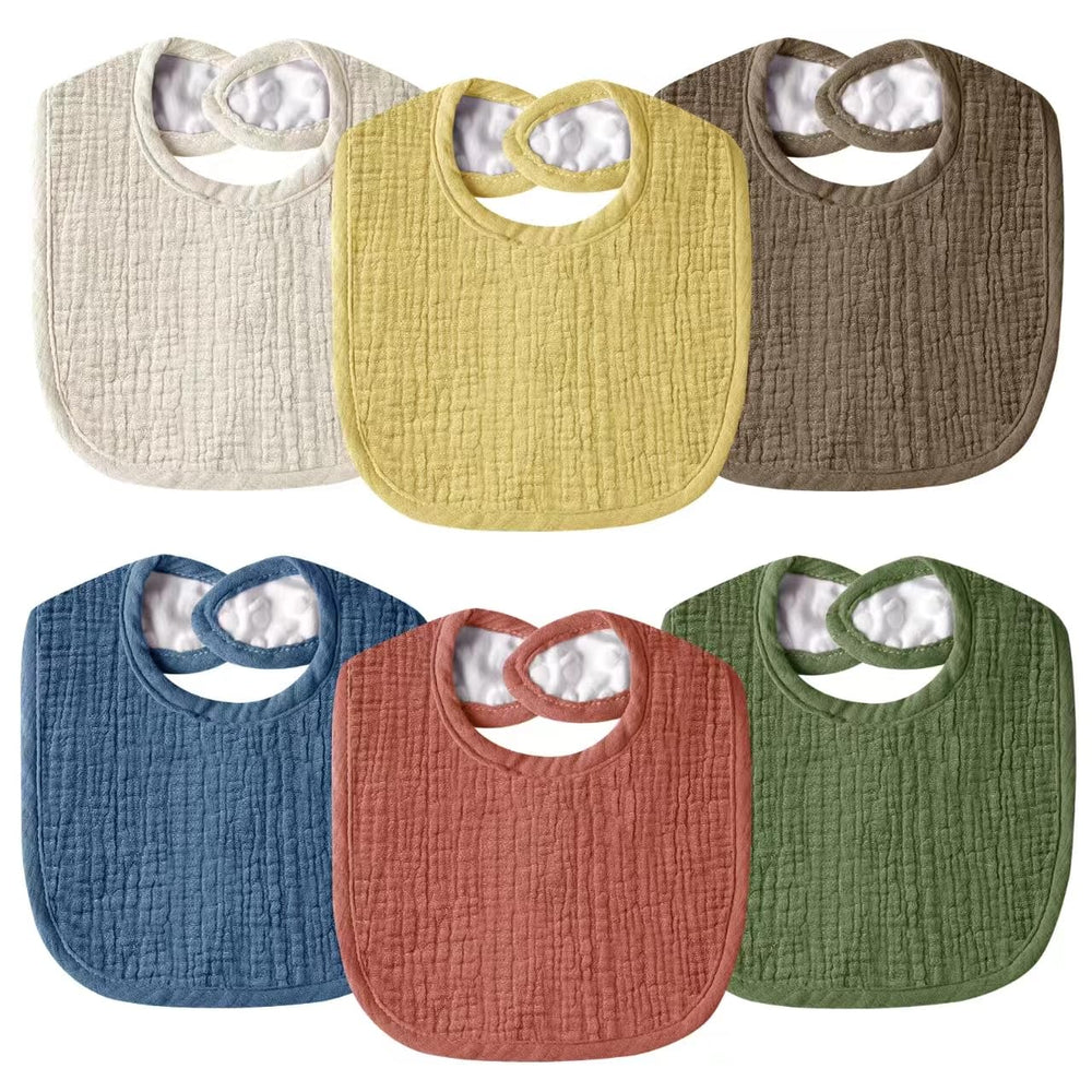 Wrrernsin muslin bibs packaging shows ready-to-use protection for messes on the go.